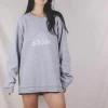 Adidaksen harmaa Y2K-college